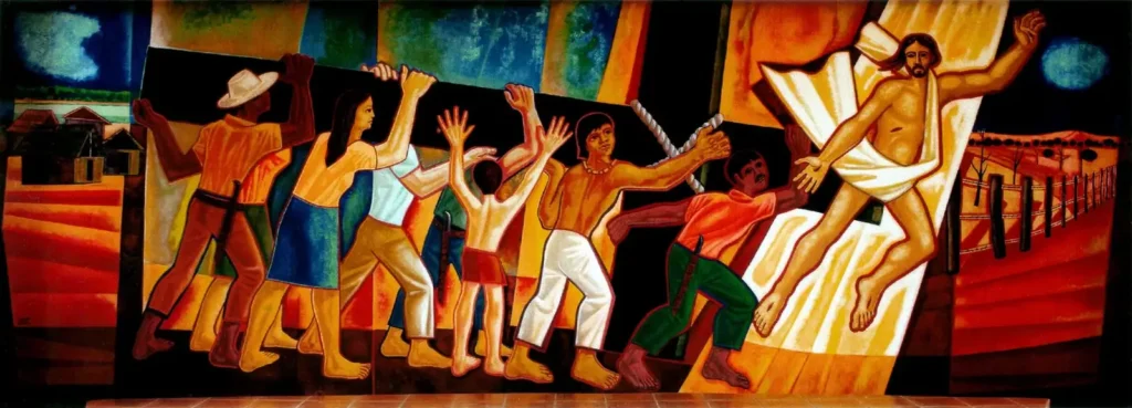 Mural de Maximino Cerezo Barredo en la catedral de la prelatura, escena de liberación y resurrección con comunidades latinoamericanas como protagonistas.